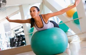 Woman using the exercise ball